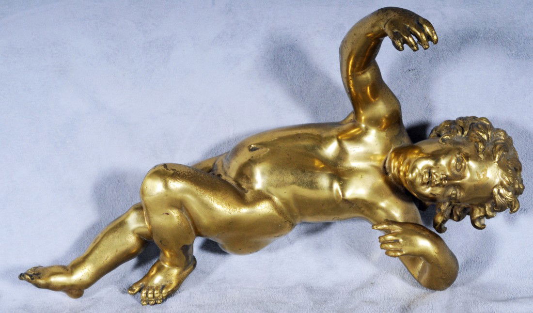 GILT BRONZE FIGURE OF A NUDE CHERUB. 12" H X 7 1/: GILT BRONZE FIGURE OF A NUDE CHERUB. 12" H X 7 1/2" W