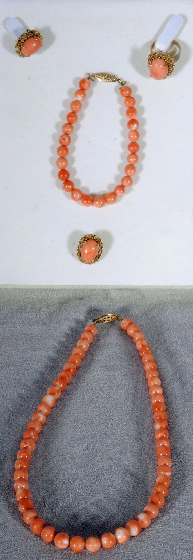 5 PC.18K YG & PINK CORAL JEWELRY SET. CONSISTING : 5 PC. 18K YG & PINK CORAL JEWELRY SET. CONSISTING OF A PR. OF EARRINGS, RING, BRACELET & A NECKLACE. (JANE WYMAN) 16" NECKLACE & 7" BRACELET
