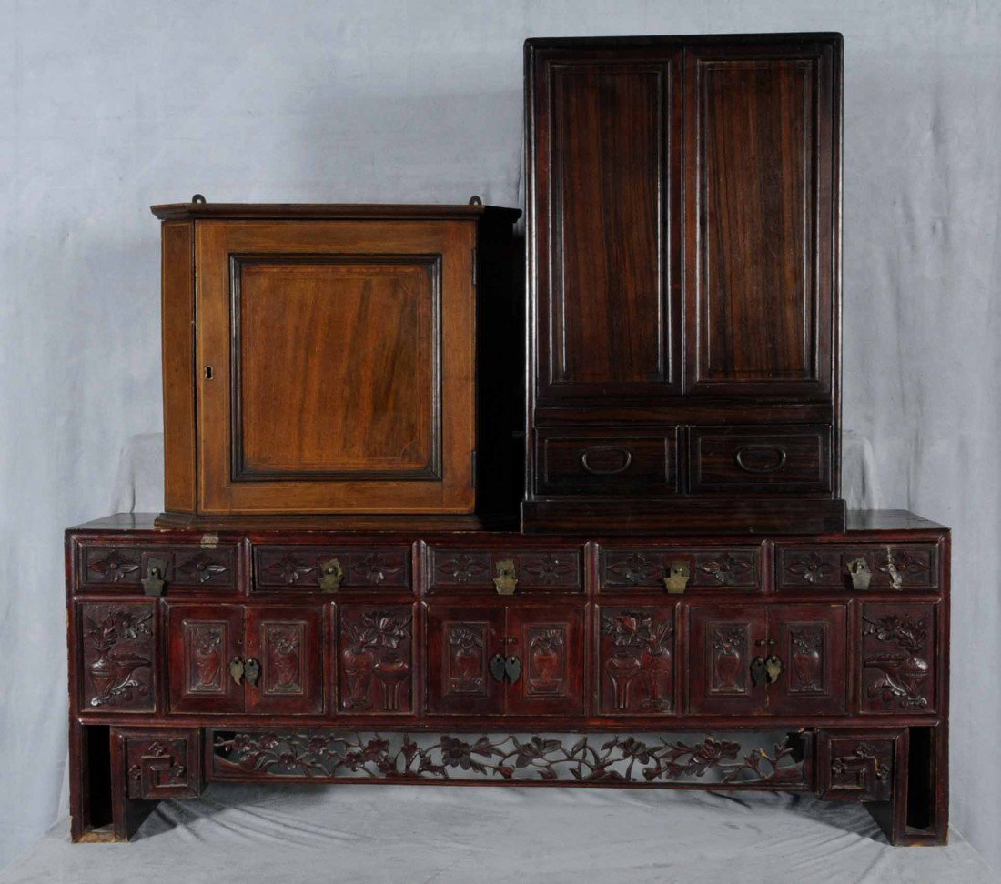 LOT OF 3 SMALL CABINETS. ONE IS AN ANTIQUE ENGLISH: LOT OF 3 SMALL CABINETS. ONE IS AN ANTIQUE ENGLISH HANGING CORNER CABINET, TEAKWOOD SHRINE AND LOW NING PO CARVED ALTAR TABLE. NO BACK ON THE SHRINE. 16 1/4" H X 18 3/4" W; 24 1/4" H X 16" D; 16" H X