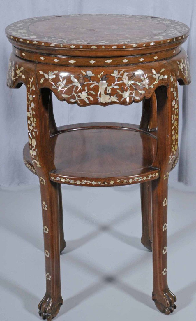 EARLY 20TH C. CHINESE ROSEWOOD M.T. STAND TWO TIERE: EARLY 20TH C. CHINESE ROSEWOOD M.T. STAND TWO TIERED W/ M.O.P. FLORAL INLAID DECORATION. INSET MARBLE TOP. 31 1/2" H X 20" DIA.
