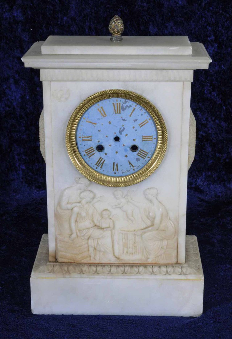 CARVED ALBASTER CLOCK CASE. FIGURES & CUPIDS DECOR: CARVED ALBASTER CLOCK CASE. FIGURES & CUPIDS DECORATE THE FRONT. FLORAL DESIGN ON THE SIDES. NO CLOCK. 16" H X 10 1/4" W.