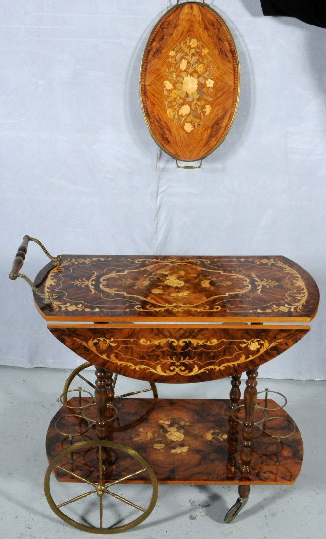 2 PC ITALIAN BURLWALNUT TEACART & OVAL TRAY. INLA: 2 PC ITALIAN BURLWALNUT TEACART & OVAL TRAY. INLAID FLORAL DESIGN W/ DROP LEAVES. OVAL GALLERY TRAY W/ MATCHING DESIGN.