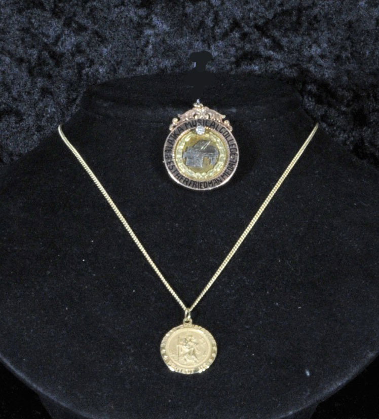 2 YELLOW GOLD MEDALS. ONE HAS A DIAMOND & FROM A MU: 2 YELLOW GOLD MEDALS. ONE HAS A DIAMOND & FROM A MUSICAL COLLEGE, THE OTHER IS A ST. CHRISTOPHER W/ A STAR OF DAVID ON THE BACK.