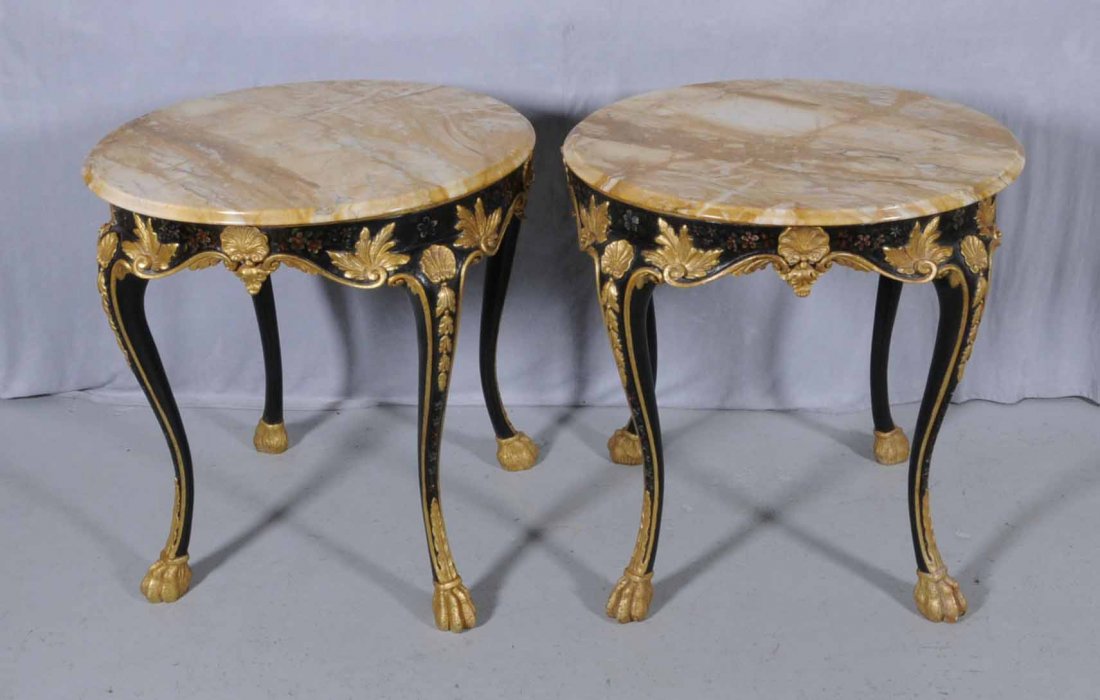 PR. ITALIAN CARVED WOOD END TABLES. BLACK BACKGROU: PR. ITALIAN CARVED WOOD END TABLES. BLACK BACKGROUND WITH GILT FLORAL AND SHELL DECORATION. GILT PAW FEET. ROUND BEVELLED MARBLE TOPS. 29 1/2" H X 31" DIA. (TK)