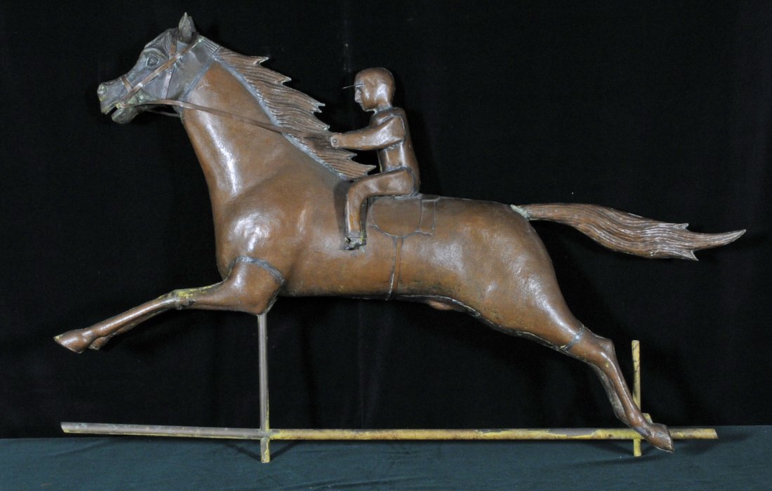 ANTIQUE COPPER WEATHER VANE DEPICTING A JOCKEY ON : ANTIQUE COPPER WEATHER VANE DEPICTING A JOCKEY ON A RACE HORSE. 31 1/4" H X 46' W X 7 1/2" D. (TK)