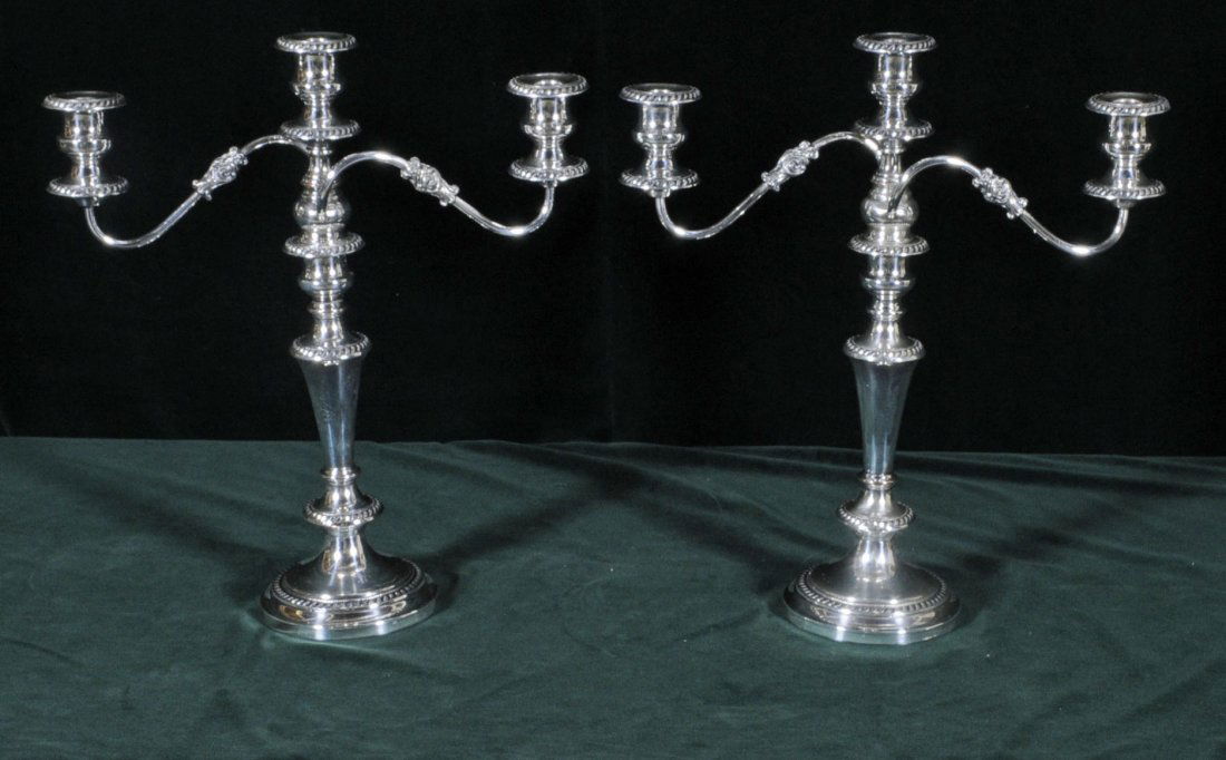 PR. SILVER PLATED 3 LIGHT CANDELABRA WITH SCROLLED: PR. SILVER PLATED 3 LIGHT CANDELABRA WITH SCROLLED ARMS. CONVERTS TO A SINGLE CANDLESTICK. 18 1/2" H X 16 1/4" W.