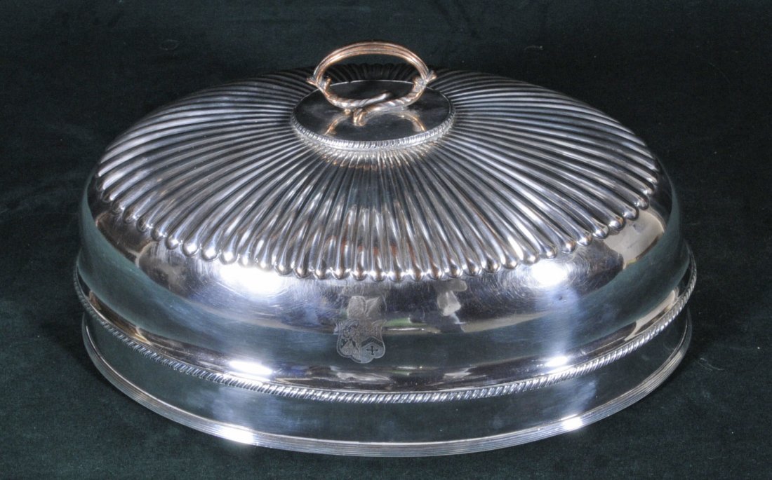 ANTIQUE ENGLISH "OLD PLATE" DOMED MEAT COVER. COAT: ANTIQUE ENGLISH "OLD PLATE" DOMED MEAT COVER. COAT OF ARMS W/ GADROON DECORATED TOP. 8" H X 15 1/2" W X 10 1/4" D.
