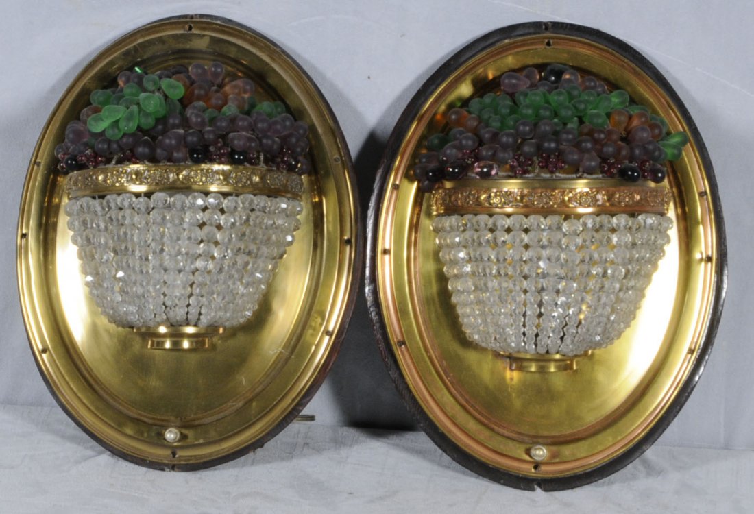 PR. METAL BASKET SHAPED WALL SCONCES. MULTI-COLOR : PR. METAL BASKET SHAPED WALL SCONCES. MULTI-COLOR BEADED FRUIT DECORATION AND CLEAR BEADS BELOW. MOUNTED ON AN OVAL BRASS PLAQUE. 16" H X 12 1/2" W. (TK)