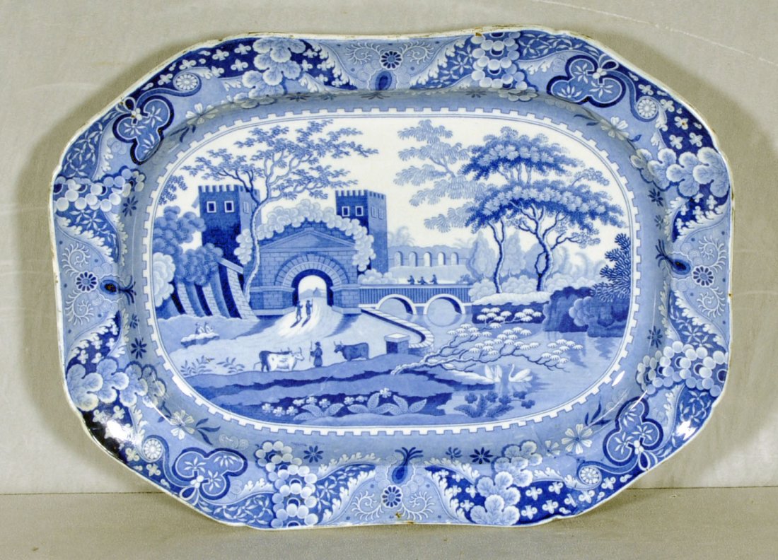 19TH C. ENGLISH BLUE & WHITE IRONSTONE TRAY. CLAWS: 19TH C. ENGLISH BLUE & WHITE IRONSTONE TRAY. CLAWS STONE CHINA W/ CATTLE & CASTLE DECORATION. 2 1/8" H X 21 1/8" W X 16 1/8" D.