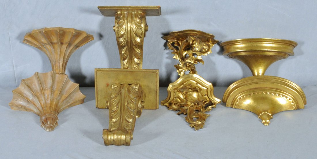 4 SETS OF GILTWOOD WALL BRACKETS. ONE PR. IS OPENW: 4 SETS OF GILTWOOD WALL BRACKETS. ONE PR. IS OPENWORK FLORENTINE, ANOTHER IS SCROLL & LEAF, ANOTHER PR. IS FLUTED THE LAST PAIR IS DEMI-LUNE (HALF ROUND). 13 1/2" H X 9" W. (TK)