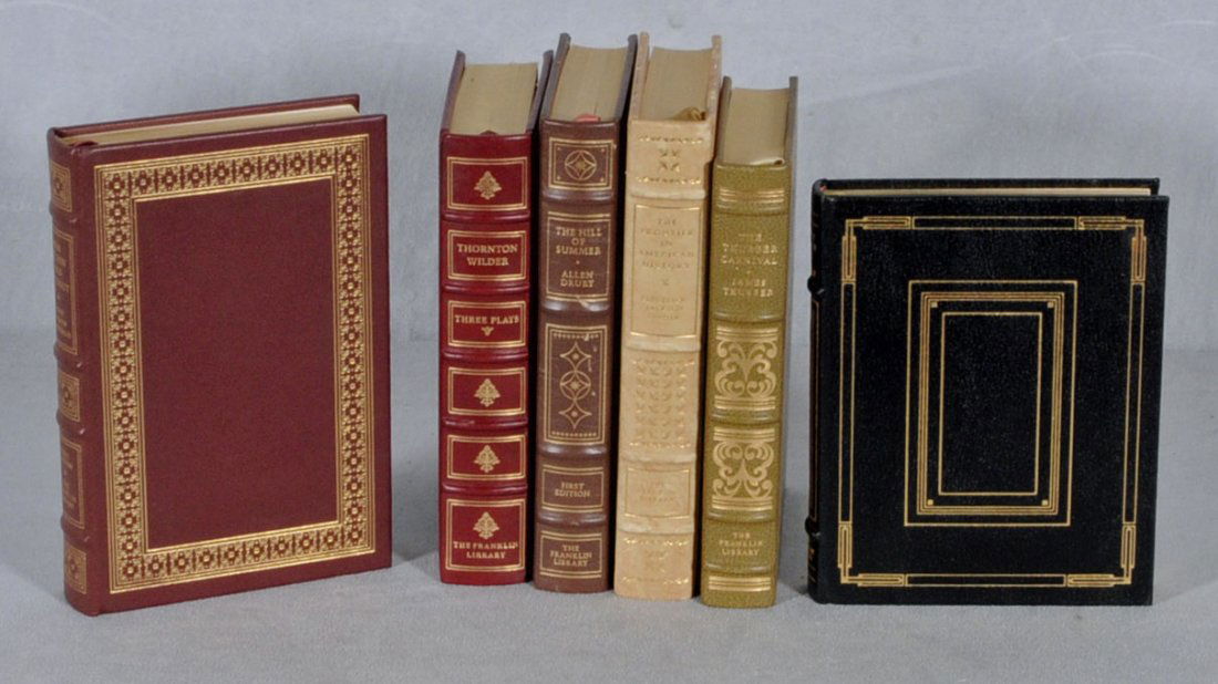 6 LEATHER BOUND BOOKS. ARTISTS ARE T. WILDER, H. C: 6 LEATHER BOUND BOOKS. ARTISTS ARE T. WILDER, H. CRANE, J. THURBER, F. J. TURNER, A. DRURY & A. M. LINDBERGH. 9 1/8" H X 6 1/8" W.