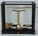 55: ANTIQUE GOLD SCALE IN A BLACK & GLASS CASE. A. DHAL