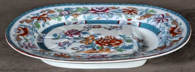 ANTIQUE IRONSTONE WELL & TREE PLATTER. MULTI- CO: ANTIQUE IRONSTONE WELL & TREE PLATTER. MULTI- COLOR DECORATION. GOOD. 2 3/4" H X 21 3/4" W X 17 " D.