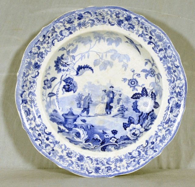 ANTIQUE LG. ENGLISH BLUE & WHITE IRONSTONE BOWL. R: ANTIQUE LG. ENGLISH BLUE & WHITE IRONSTONE BOWL. ROUND SHAPED, "MADARIN OPAQUE" CHINA PATTERN. GOOD. 2 3/4" H X 17 3/8" W.