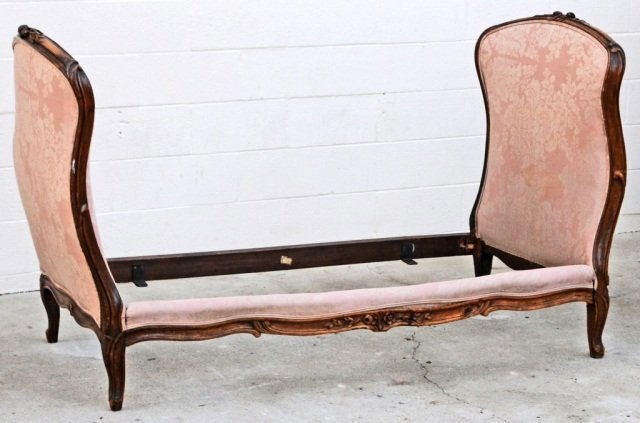 ANTIQUE FRENCH LOUIS XV STYLE CARVED DAY BED. FLOR: ANTIQUE FRENCH LOUIS XV STYLE CARVED DAY BED. FLORAL DECORATED FRAMES. PINK UPHOLESTRY. BED COMPLETE W/ RAILS. INSIDE. 60" X 28". GOOD. 43 1/4" H X 70" W X 31 1/4" D. (TK)