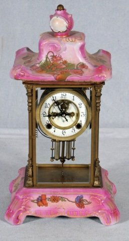PINK FLORAL PORCELAIN REGULATOR CLOCK WITH BEVELLE: PINK FLORAL PORCELAIN REGULATOR CLOCK WITH BEVELLED GLASS ON ALL SIDES. GOOD. REPRO FROM CHINA. CLOCK NOT WORKING. 17 1/2" H X 9 1/2" W X 7 1/2" D.