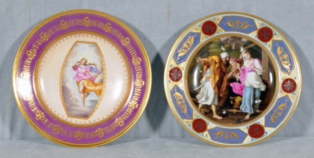 2 ANTIQUE ROYAL VIENNA PORCELAIN PAINTED PLATES.: 2 ANTIQUE ROYAL VIENNA PORCELAIN PAINTED PLATES. BURGUNDY BORDER W/ FIGURE OF A WOMAN & RAISED GILT DECORATION. MIDDLE EASTERN FIGURAL SCENE, BLUE & BURGUNDY BORDERS W/ RAISED GILT DECORATION. GOOD. 9