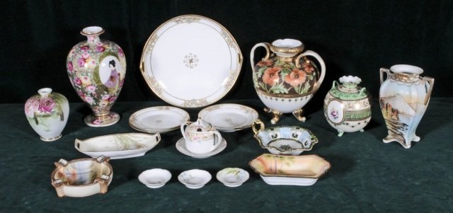 18 PC. LOT OF JAPANESE PAINTED NIPPON PORCELAIN,: 18 PC. LOT OF JAPANESE PAINTED NIPPON PORCELAIN. CONSISTING OF A ROUND TRAY,4 PLATES,5 VASES,SMALL TRAY & 4 SMALL ROUND PLATES,ASHTRAY, 2 BOWLS & A SUGAR BOWL. GOOD. 8 1/2" H X 8 1/2" W X 6 1/2" D.