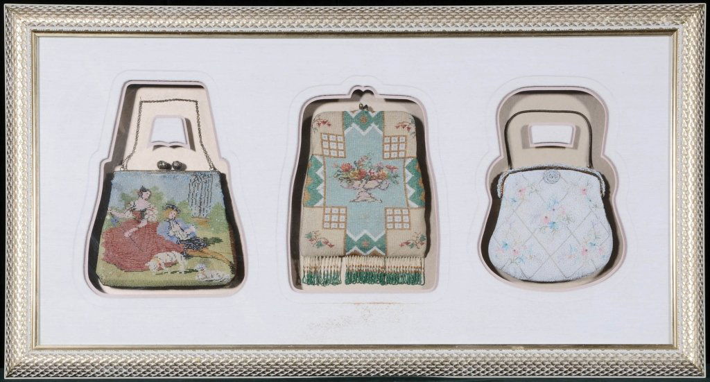 3 ANTIQUE FRAMED MULTI-COLORED BEADED BAGS. WHITE AND G: 3 ANTIQUE FRAMED MULTI-COLORED BEADED BAGS. WHITE AND GILT SHADOW BOX FRAME. GOOD. TALLEST 10" H X 7'" W.