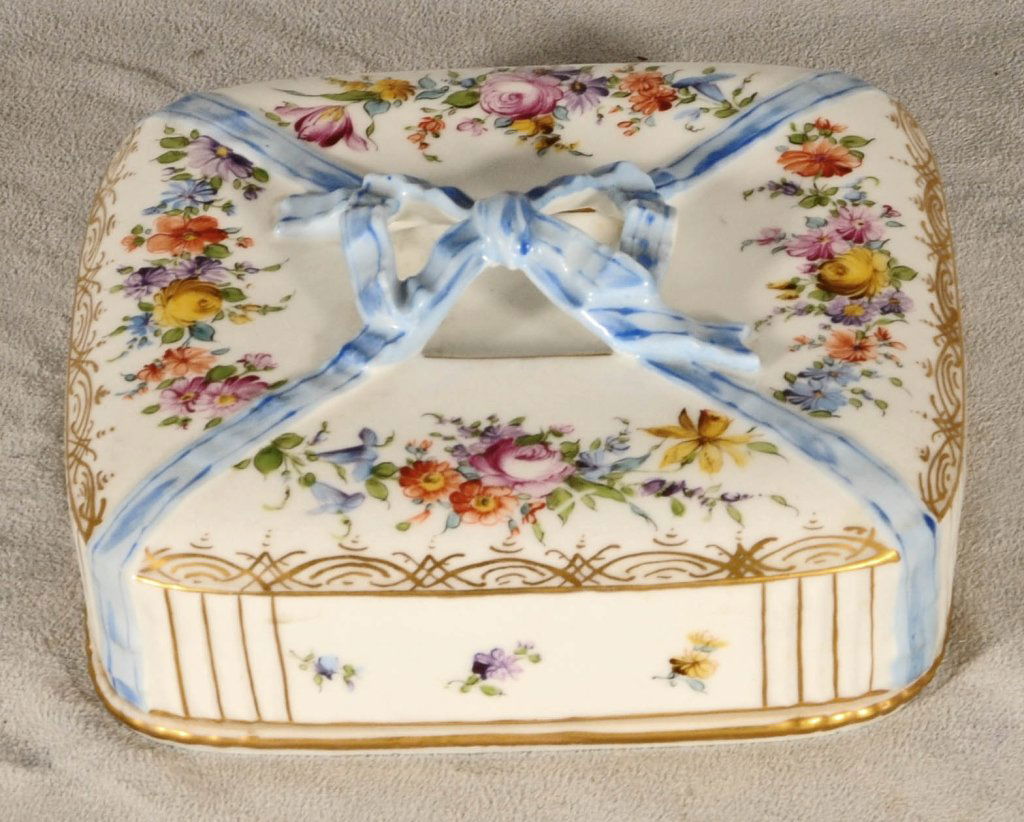 DRESDEN PORCELAIN BOX. BLUE RIBBON AND MULTI-COLOR FLO: DRESDEN PORCELAIN BOX. BLUE RIBBON AND MULTI-COLOR FLORAL DECORATION. GOOD. 2 1/2" H X 6 1/4" SQ.