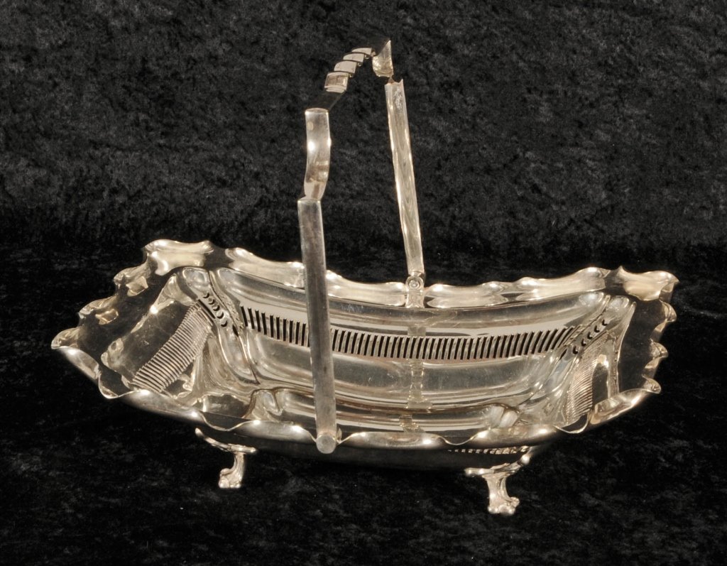 ENGLISH "OLD PLATE" SILVER PLATED BASKET. OPEN WORKED S: ENGLISH "OLD PLATE" SILVER PLATED BASKET. OPEN WORKED SIDES AND CRIMPLED RIM. MAKER; S. P. C. CO., SHEFFIELD. GOOD. 9 1/2" H X 12 1/4" W X 10 1/2" D.