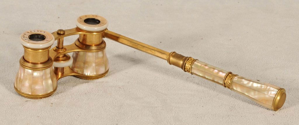 PAIR FRENCH MOTHER OF PEARL OPERA GLASSES. EXTENTION H: PAIR FRENCH MOTHER OF PEARL OPERA GLASSES. EXTENTION HANDLE. GOOD. 8" H X 4" W X 1 1/2" D.