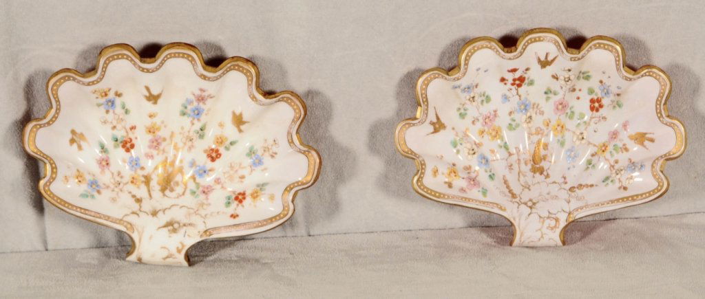 2 BOHEMIAN GLASS SHELL SHAPED DISHES. MULTI - COLOR FLO: 2 BOHEMIAN GLASS SHELL SHAPED DISHES. MULTI - COLOR FLORAL AND BIRD DECORATION. ONE REPAIRED W/ RIVETS. 1 1/4" H X 7 1/4" W X 5 1/2" D.