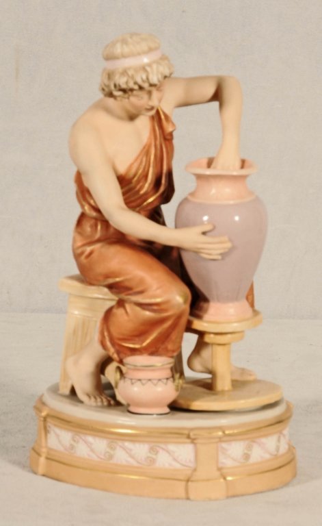 ROYAL DUX FIGURE OF A LADY MAKING A VASE. GOOD. 11 1/2": ROYAL DUX FIGURE OF A LADY MAKING A VASE. GOOD. 11 1/2" H X 7" W X 6" D.