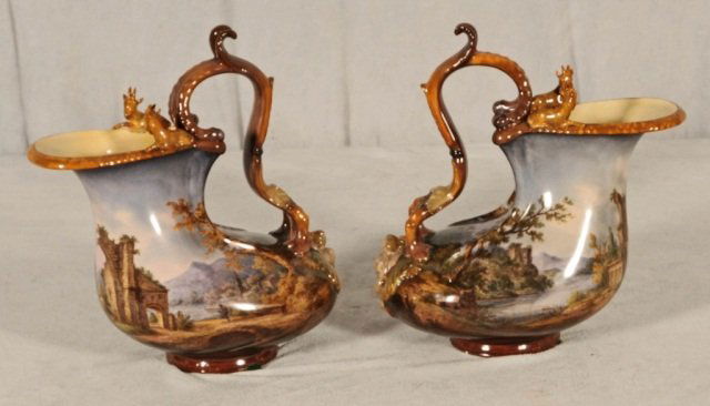PAIR OF ANTIQUE K.P.M. SHELL SHAPED VASES. HAND PAINTED: PAIR OF ANTIQUE K.P.M. SHELL SHAPED VASES. HAND PAINTED SCENES. GOOD. 9 1/4" H X 8 1/4" W X 4 1/2" D.