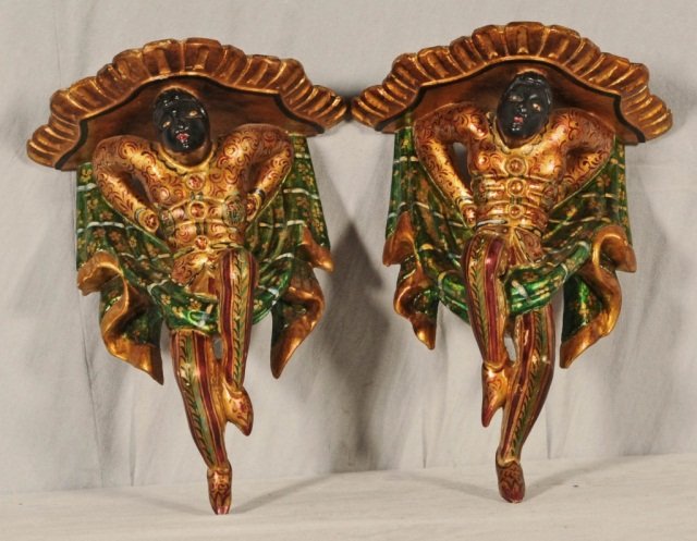 PR OF WALL BRACKETS WITH NUBIAN FIGURAL SUPPORTS.: PR OF WALL BRACKETS WITH NUBIAN FIGURAL SUPPORTS. GOOD. 14" H X 10 3/4" W X 6 1/2" D.