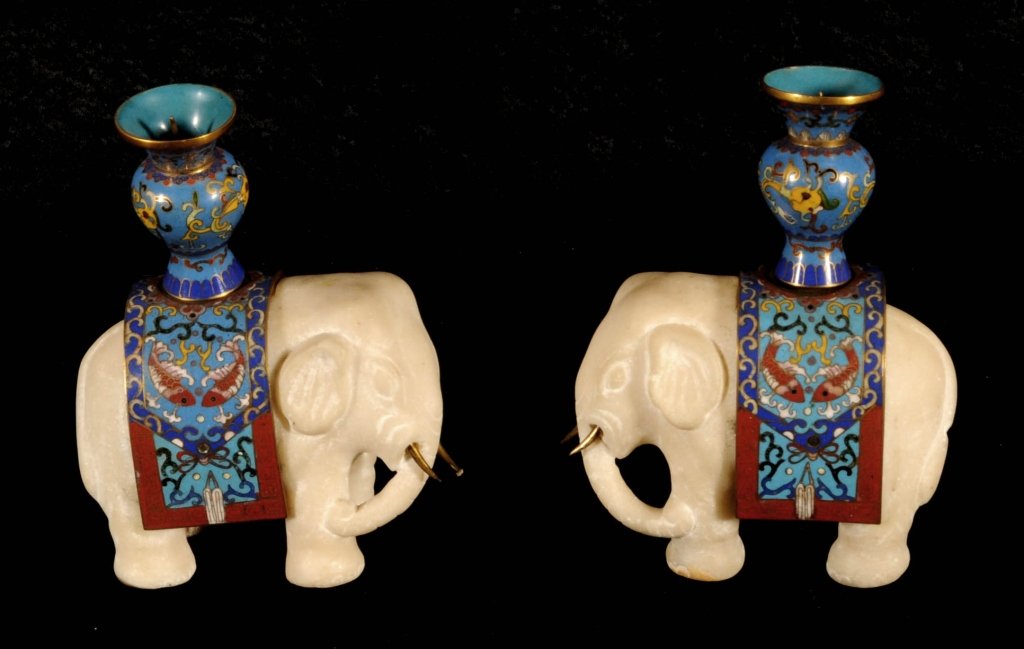 PR. CHINESE CARVED ALABASTER & CLOISONNE ELEPHANT: PR. CHINESE CARVED ALABASTER & CLOISONNE ELEPHANT CANDLE STICKS. BLUE & MULTI COLOR ENAMEL SADDLES ON THE ELEPHANTS. GOOD. 7" H X 5" W X 2 1/2" D.