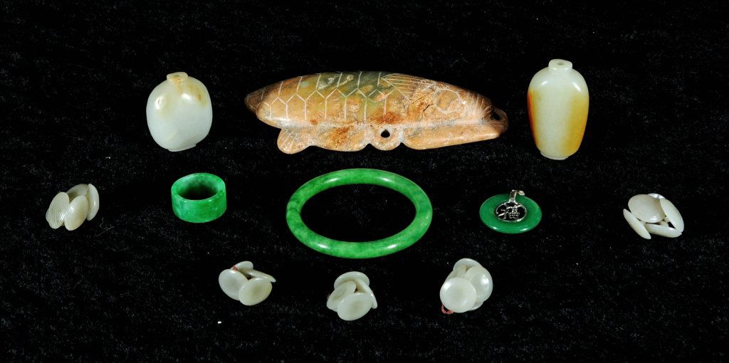 LOT OF JADE PCS. CONSISTING OF A BEETLE, 2 SNUFF: LOT OF JADE PCS. CONSISTING OF A BEETLE, 2 SNUFF BOTTLES, RING, BRACELET, PENDANT & 3 SETS OF 4 JADE BUTTONS. GOOD. BEETLE 5 3/8" L X 2 3/4" W.
