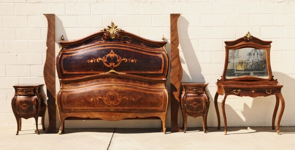4 PC. ITALIAN BOMBE SHAPED BEDROOM SET. MARQUETRY: 4 PC. ITALIAN BOMBE SHAPED BEDROOM SET. MARQUETRY INLAID DECORATION WITH ORMOLU MOUNTS. CONSISTING OF A KING SIZE BED (INSIDE 77" X 65 1/2"), VANITY WITH MIRROR AND A PR. OF NIGHT STANDS. VANITY 74" H