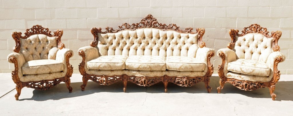 3 PC. ITALIAN CARVED WALNUT SALON SET. CONSISTING OF A: 3 PC. ITALIAN CARVED WALNUT SALON SET. CONSISTING OF A SETTEE AND A PAIR OF CLOSED ARM CHAIRS. OPEN WORKED FRAMES AND TUFTED UPHOLESTRY. GOOD.