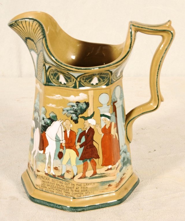 BUFFALO POTTERY "DELDAREWARE" PITCHER. FIGURAL: BUFFALO POTTERY "DELDAREWARE" PITCHER. FIGURAL DECORATION. DATED 1911. GOOD. 8 1/2" H X 7 3/4" W.