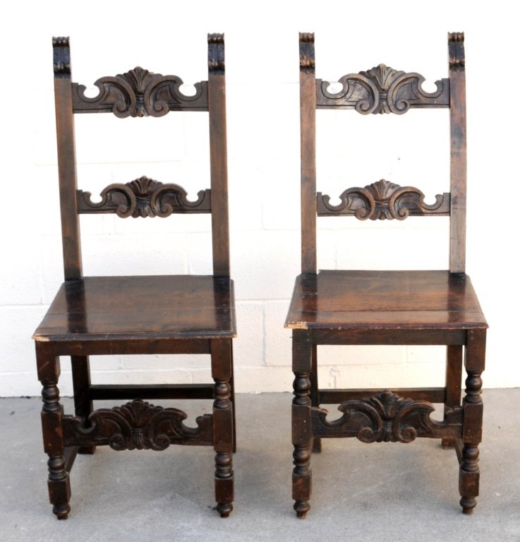 2 ANTIQUE MAHOGANY RENAISSANCE CARVED SIDE CHAIRS.: 2 ANTIQUE MAHOGANY RENAISSANCE CARVED SIDE CHAIRS. SCROLLED BACK RAILS. STRETCHER & TURNED LEGS. GOOD. 41 1/2" H X 18 1/4" W.