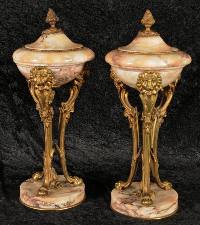 PR. ANTIQUE FRENCH ONYX & BRONZE URNS. FINIALS AT THE: PR. ANTIQUE FRENCH ONYX & BRONZE URNS. FINIALS AT THE TOP, URN SUPPORTED BY 3 LION HEADS WITH SCROLL AND LEAF DECORATION AND TERMINATING IN PAWS. ROUND ONYX BASE. 1 FINIAL BENT. 19" H X 8" DIA.