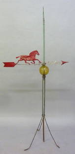 Circa 1900 Zink & Cast Iron Horse Weathervane with a: Circa 1900 Zink & Cast Iron Horse Weathervane with a Amber Glass weathervane ball. Height 66" width of arrow 31". A few bullet holes.