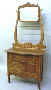 Circa 1900 Oak Washstand with Towel Bar & Tilting Bevel: Circa 1900 Oak Washstand with Towel Bar & Tilting Bevel Mirror - h 70" w 32" d 17". Found in SE Mn. Good refinished condition.