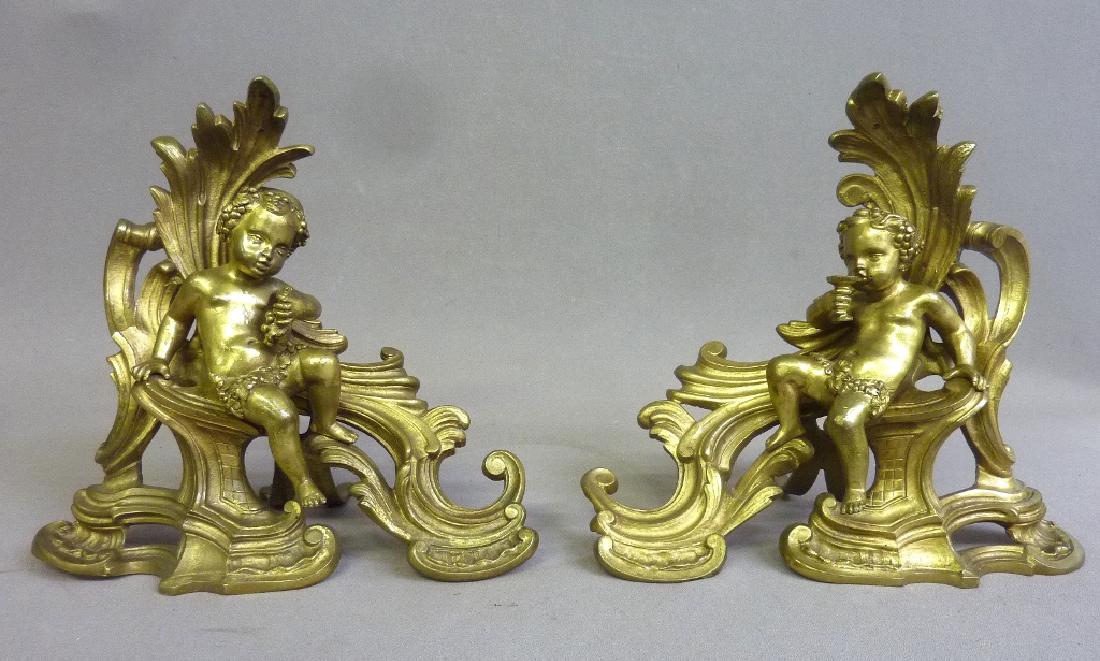 Circa 1900 Cast Bronze Cupid Drinking Wine Andirons - h: Circa 1900 Cast Bronze Cupid Drinking Wine Andirons - h 12 1/2" w 13" d 7". Good condition. Found in St Paul Mn.