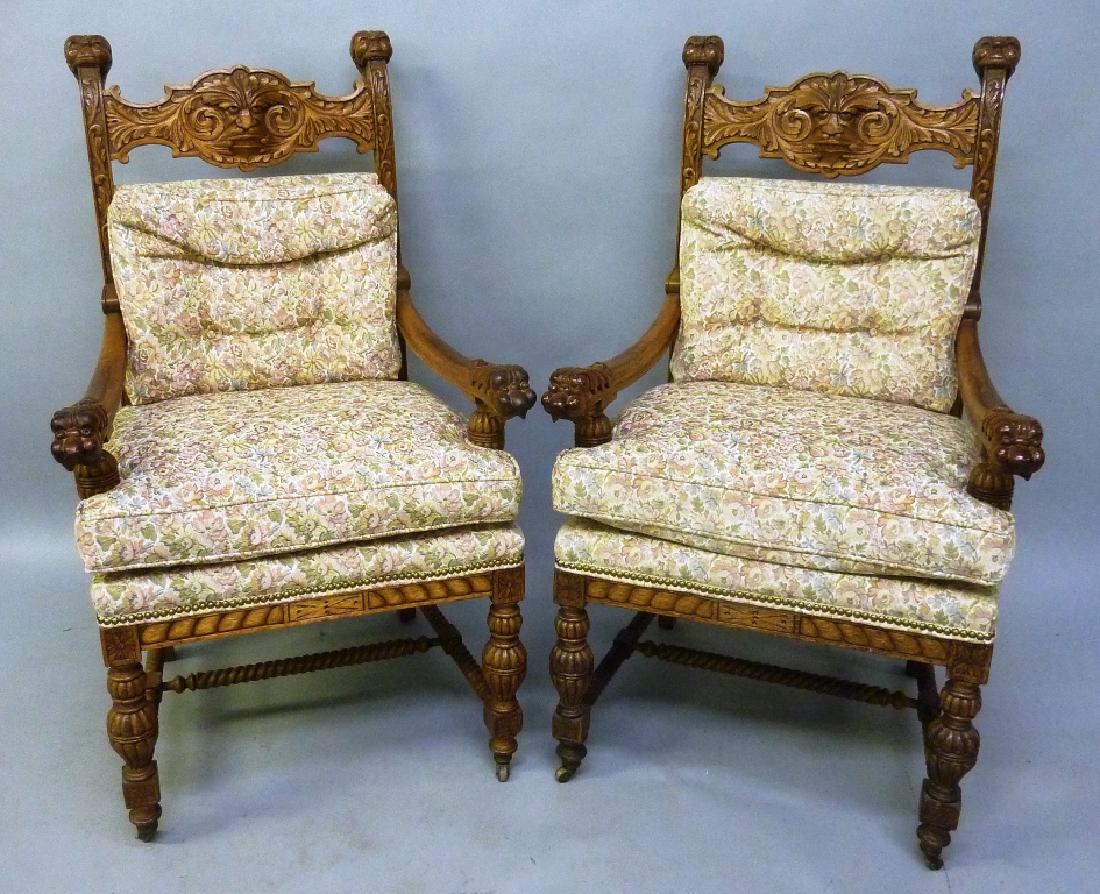 Circa 1890's Heavily Carved North Wind Face Arm Chairs: Circa 1890's Heavily Carved North Wind Face Arm Chairs with 3 faces per chair. American made. H 46" w 26" d 28". Found in Wayzata home. Great condition with clean upholstery ready to use.