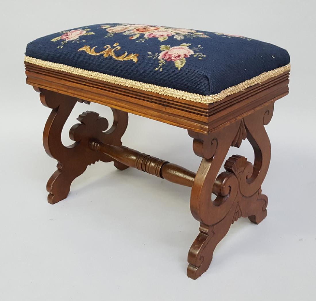 Circa 1880's Walnut American Made Footstool with floral: Circa 1880's Walnut American Made Footstool with floral needlepoint upholstery. Hgt 18" w 21" d 12". Good condition. Found in Galesville WI estate.