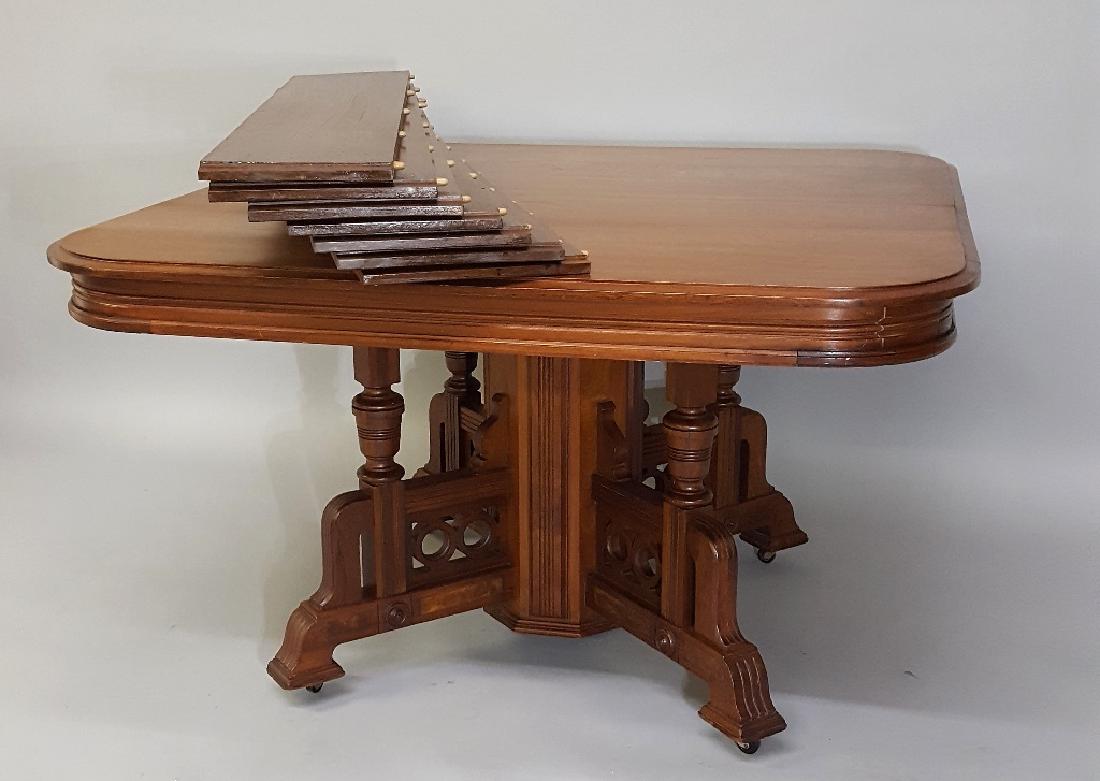 Circa 1880's Burl Walnut Eastlake Dining Table with 6 -: Circa 1880's Burl Walnut Eastlake Dining Table with 6 - 8" to 10" leaves. 48" closed, 9'10" extended. Good solid working condition with good finish. Found in Rochester MN estate.