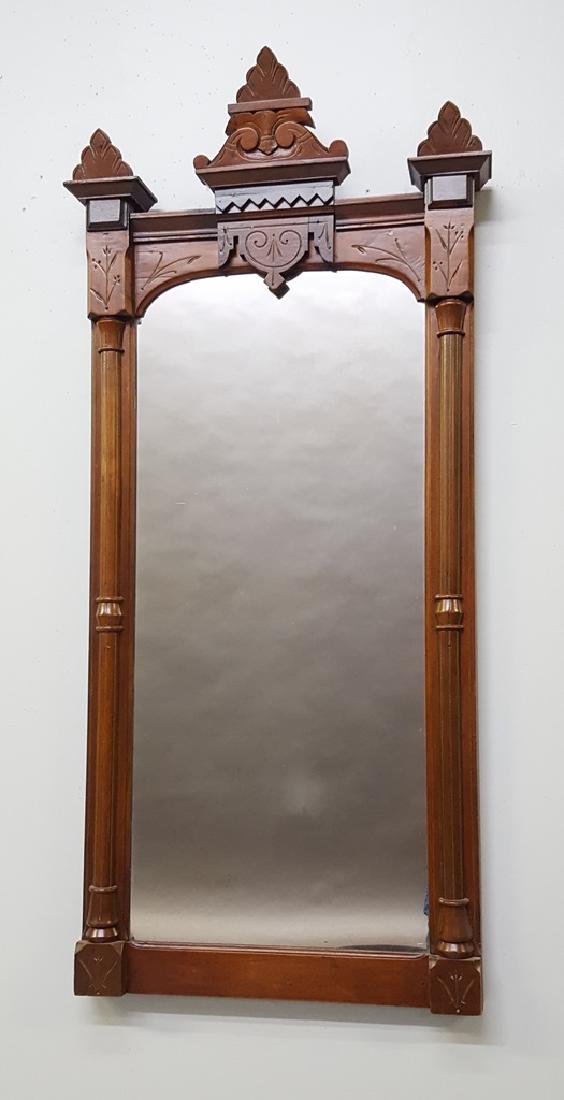 American Circa 1870's Renaissance Revival Wall Mirror: American Circa 1870's Renaissance Revival Wall Mirror with black & gold trim. Hgt 54" w 24". Good original finish & condition. Found in Hudson WI home.