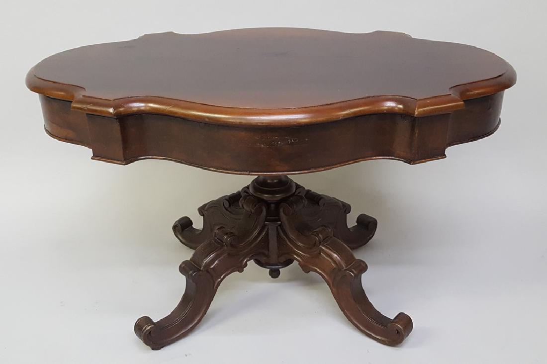 Circa 1850's Carved Turtle Top Coffee Table - Early: Circa 1850's Carved Turtle Top Coffee Table - Early carved mahogany table with decorative base. Hgt 21.5" width 36" d 24". Found in Galesville WI estate.