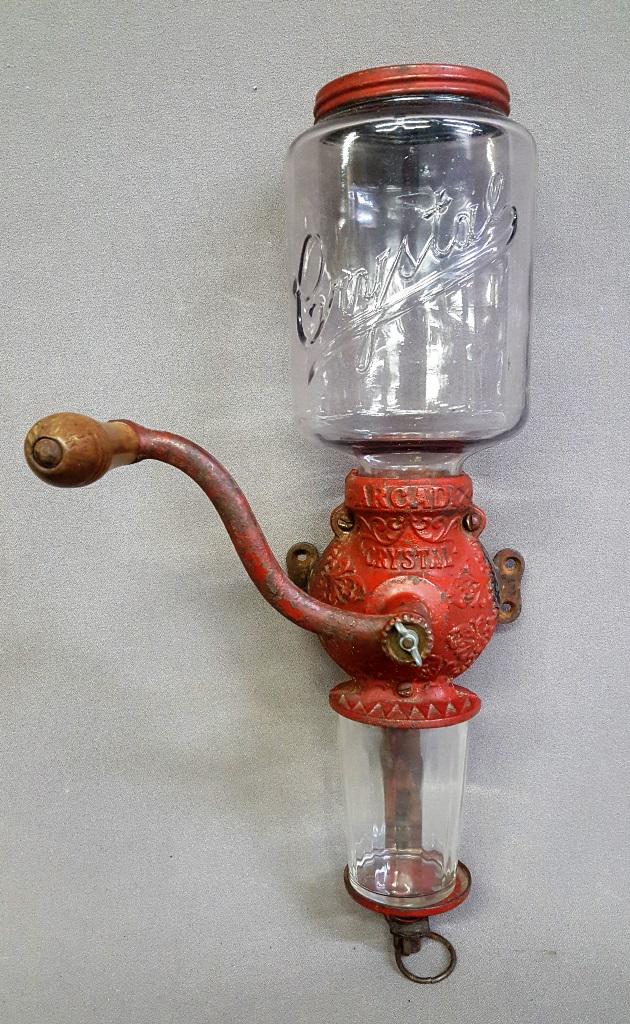 Signed (Arcade Crystal) cast iron & glass coffee: Signed (Arcade Crystal) cast iron & glass coffee grinder - Circa 1900 - complete working condition. Hgt 17" w 8" d 8". Found in Minnetonka MN estate.