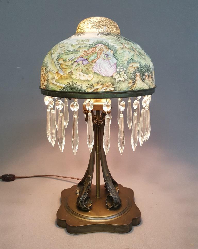 Unique Circa 1920's Glass tapestry Scenic Shade on: Unique Circa 1920's Glass tapestry Scenic Shade on signed Pairpoint base -Shade probably Royal Bayreuth. Rewired good working condition. Shade is perfect no chips. Hgt 16" dia. 9.5".