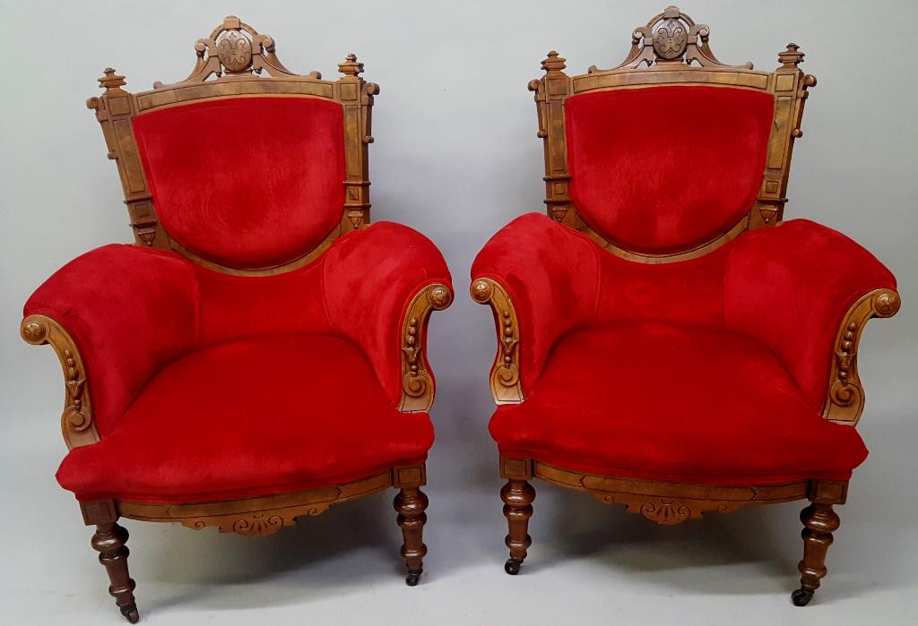 Pair of 1870's American Burl Walnut Arm Chairs - they: Pair of 1870's American Burl Walnut Arm Chairs - they have good carved cresting with arm decoration and retaining the original castors. Old refinish. Frames are solid, upholstery is clean. H 43" w 32"