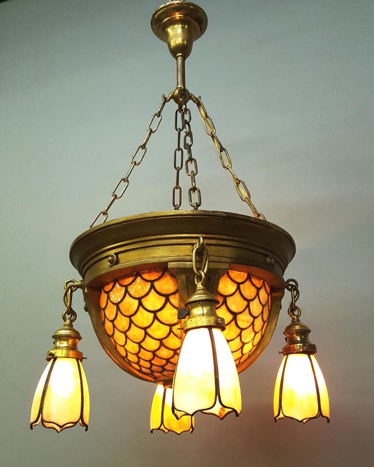 C 1920's Slag Glass Lamp w/Signed Handel Slag Shades -: C 1920's Slag Glass Lamp w/Signed Handel Slag Shades - Unusual Chandelier with fish scale carmel slag glass and all 4 slag shades signed Handel. Hgt 35" dia. 17". All glass good condition. Found in Ch