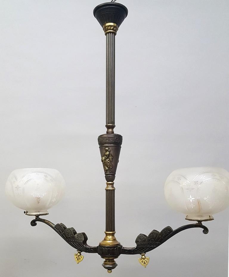 C 1870's 2 Arm Gasolier Asthetic Fixture w 1870's: C 1870's 2 Arm Gasolier Asthetic Fixture w 1870's Shades - hgt 28" width 26". Has rare antique 2 5/8" fitter etched shades. Rewired ready for electic use. Found in Eau Claire WI estate. Good condition